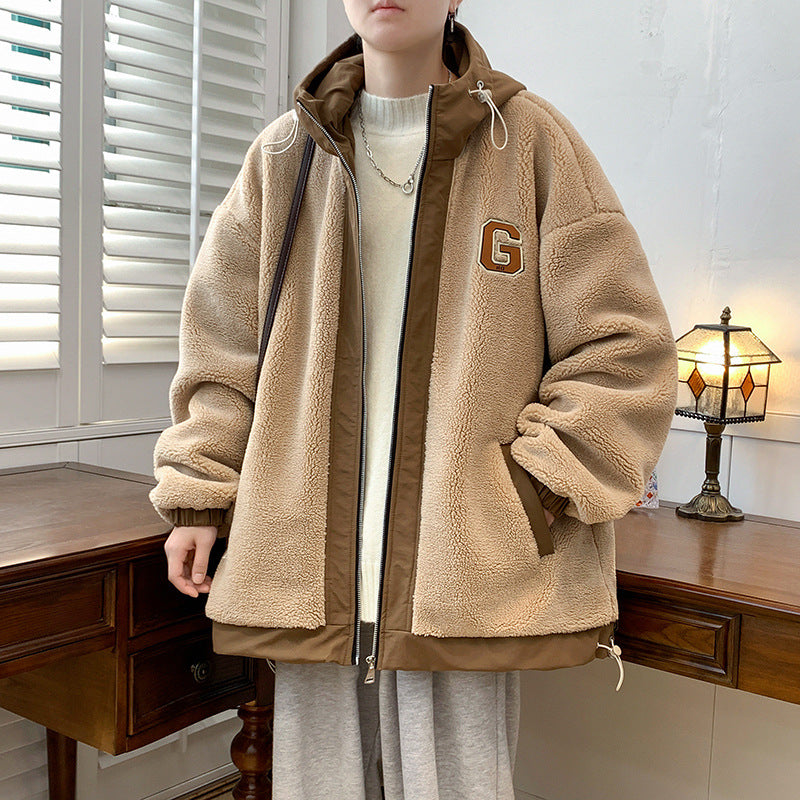 Model wearing a khaki hooded jacket with side pockets